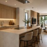 Comparamos isla y península de cocina según espacio, circulación, almacenamiento y forma de vida para elegir la solución más funcional.